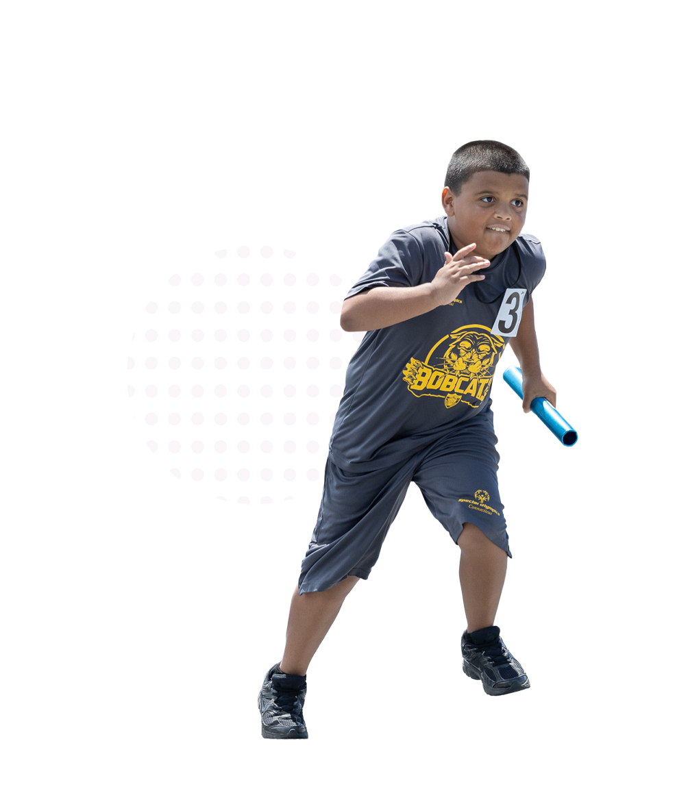 Boy running a relay race
